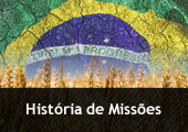 Bandeira do Brasil sobre sólido árido e campo de trigo - com a inscrição História de Missões